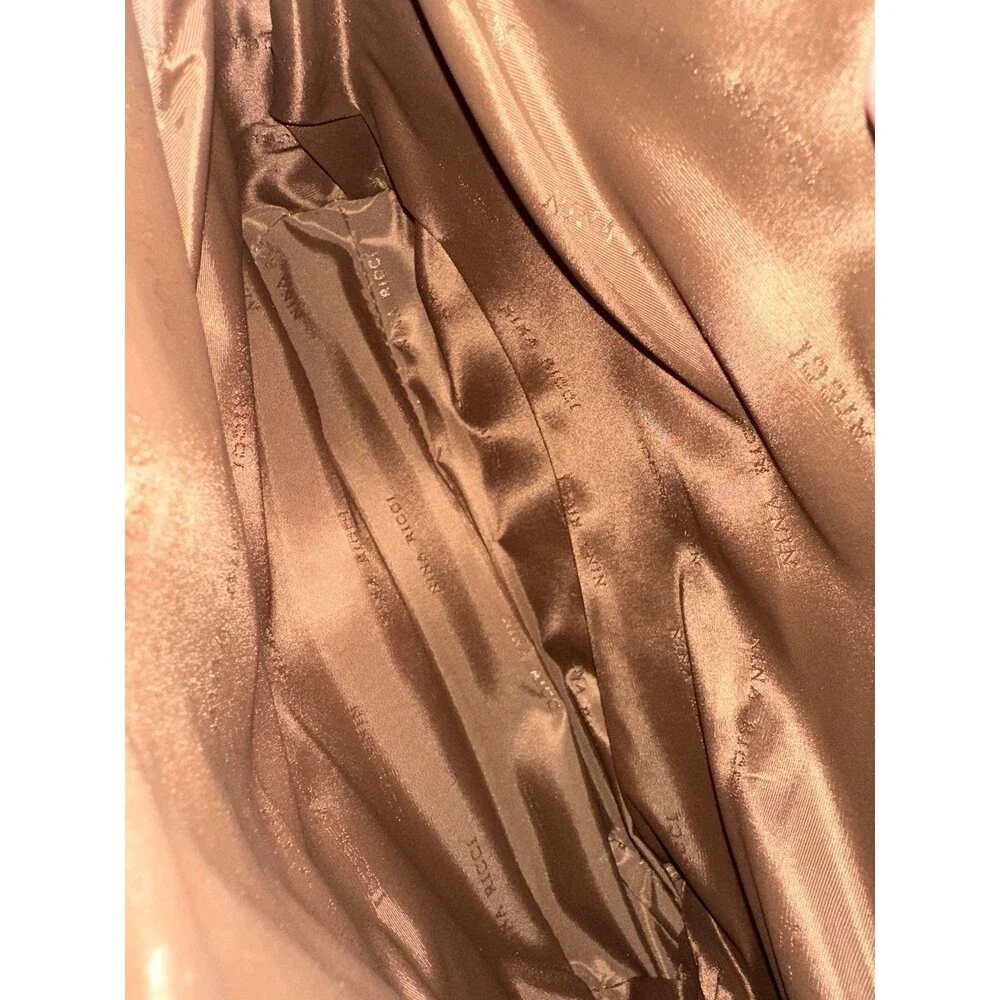 Nina Ricci 12x9x4 examine